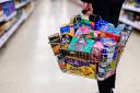 Undated handout photo issued by Premier Foods of a shopping basket full of their goods. The owner of Mr Kipling, Bisto and Angel Delight has revealed a fall in sales despite bosses saying they successfully navigated the global supply chain issues hitting 