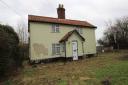 The cottage, which currently has two bedrooms and two reception rooms, would make a great renovation project
