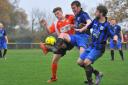 Diss, orange, will be playing Thurlow Nunn First Division football next season. Picture: SIMON FINLAY
