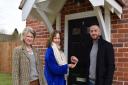 Cllr Lavinia Hadingham, Mid Suffolk District Council’s cabinet member for housing receives the keys to the nine new affordable homes from Oliver Burgess sales and marketing director at Burgess Homes with ward member Cllr Jessica Fleming.