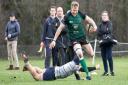 Jim Riley evades a tackle as North Walsham gained the upper hand against Old Priorians in London Picture: HYWEL JONES