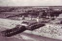 Great Yarmouth's Wellington Pier when holidaymakers were filling the beach as midday approached on August 4, 1952.