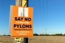 Anti-pylon poster where new line would be built near Diss