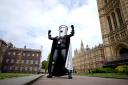 Mayor of London election candidate Count Binface poses outside Parliament in London. (Aaron Chown/PA)
