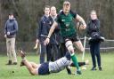 Jim Riley evades a tackle as North Walsham gained the upper hand against Old Priorians in London Picture: HYWEL JONES