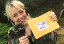 Radio Norfolk Treasure Quest presenter Sophie Little with a clue