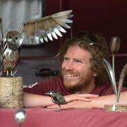 Scultptor James Barrett-Nobbs with some of his bird pieces made from cutlery