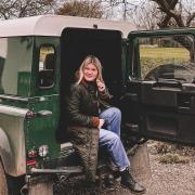Hayley Southwood in Nelson, the couple's Land Rover, which they use to explore their new home county