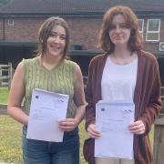 Julia Vlckova and Brier Wycherley with their A-Level results at Thetford Academy Sixth Form