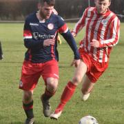 Action from Norwich CEYMS' 2-2 draw with Wymondham Town. Picture: Sonya Duncan