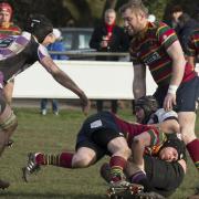 Jake Wharton gets a tackle in as Norwich take on league leaders Woodford at Beeston Hyrne in a match the visitors won 26-12 Picture: ANDY MICKLETHWAITE