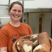 Baker Henrietta Inman with sone of her wholemeal loaves at Wakelyns Bakery in Fressingfield