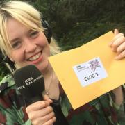 Radio Norfolk Treasure Quest presenter Sophie Little with a clue