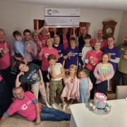 Geoff Gapp and his family have presented a £62,000 cheque to Cancer Research UK, raised in memory of his late wife Gunvor